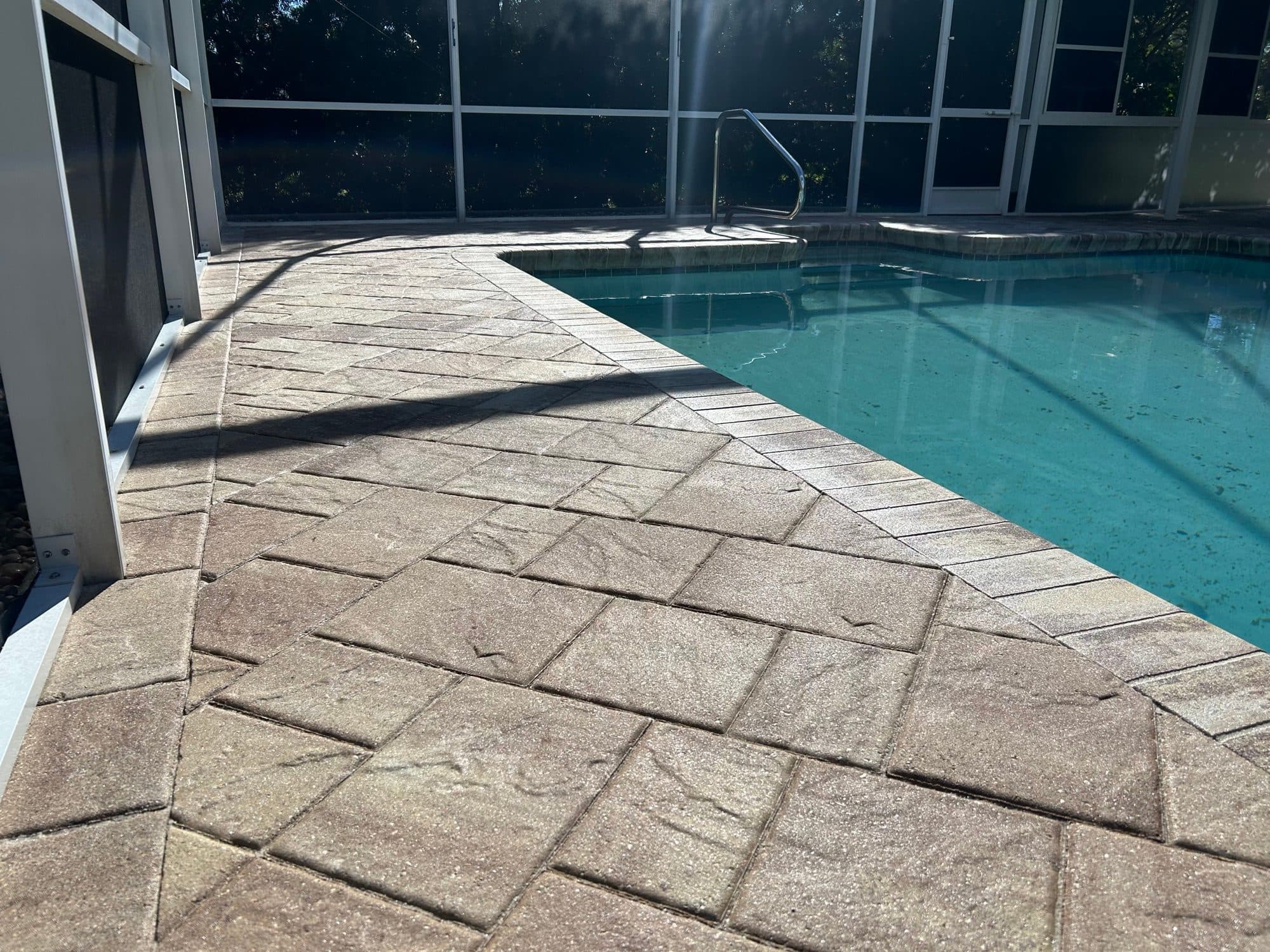 Screened pool deck pavers — paver work by Atlantic Exteriors in Brevard County, FL